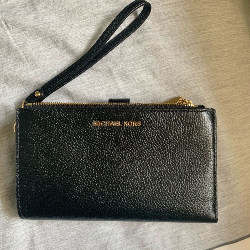 Black and gold Michael Kors Wristlet